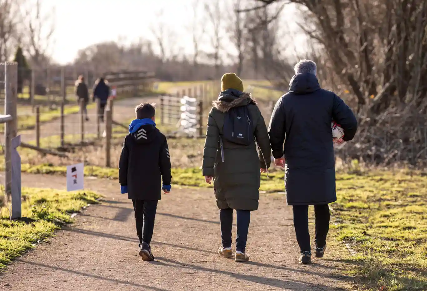 People walking on the Lake Loop Christmas Trail at Waterbeach