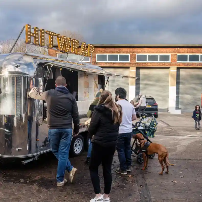 People queueing at a food van